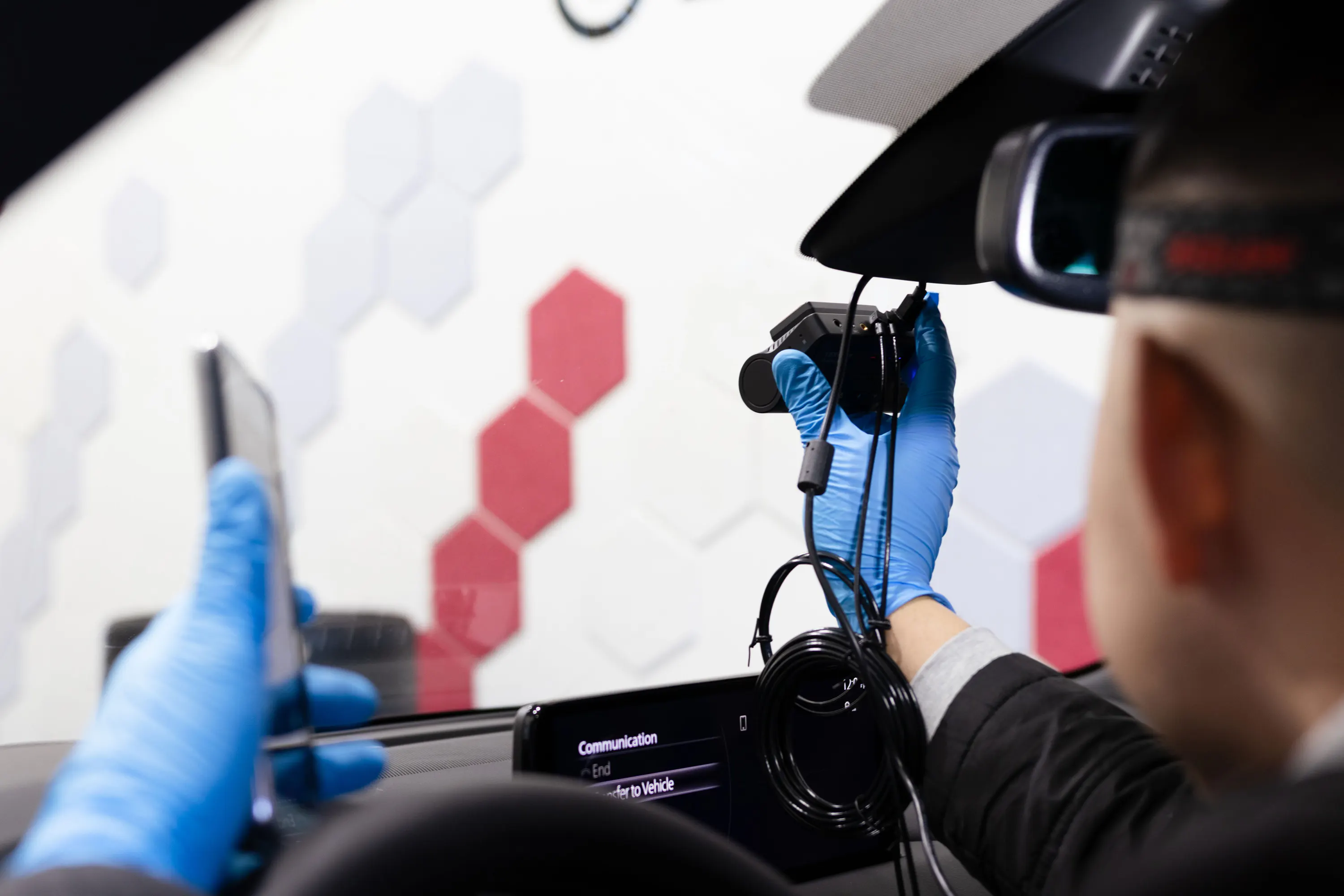 Fitting a dash cam to the windscreen beside the mirror